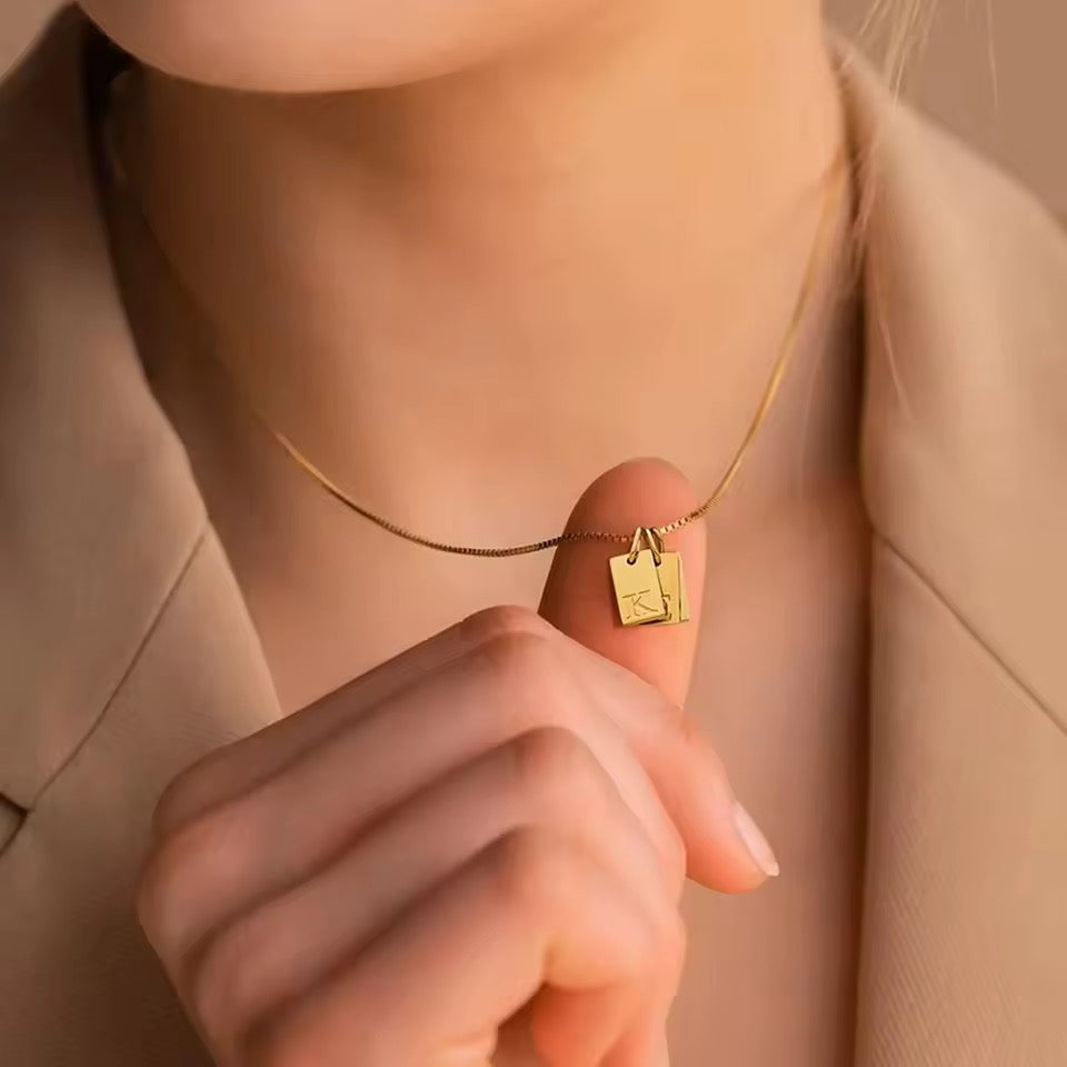 Initial tag necklace